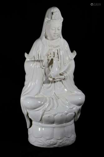 Large porcelain Quan Yin.