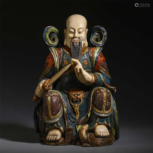 A CHINESE SOAP STONE ZHENGWU EMPEROR SEATED STATUE