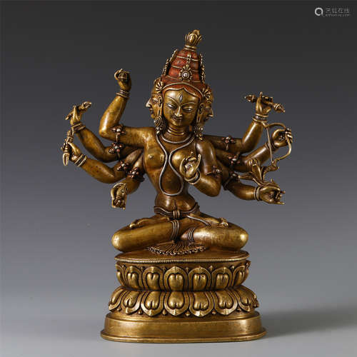 A CHINESE BRONZE INLAID SILVER FOUR FACE EIGHT ARM SEATED GUANYIN