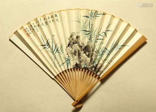 CHINESE PAINTED SCROLLL FAN OF BAMBOOS ON ROCK WITH CALLIGRAPHY BY WU HUFAN