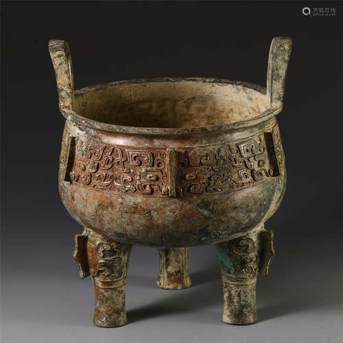 A CHINESE BRONZE TRIPLE FEET DOUBLE HANDLE CENSER