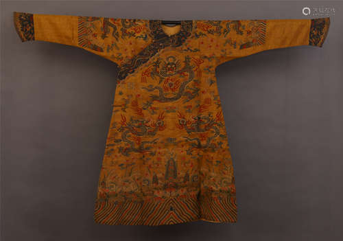 A CHINESE GOLDEN SILK EMBROIDERD DRAGON ROBE