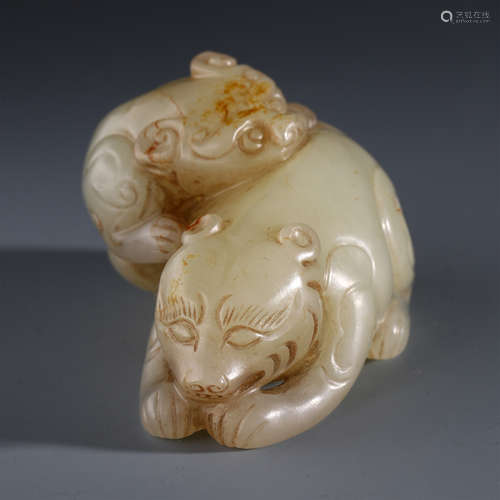 A CHINESE JADE BEAST TABLE ITEM