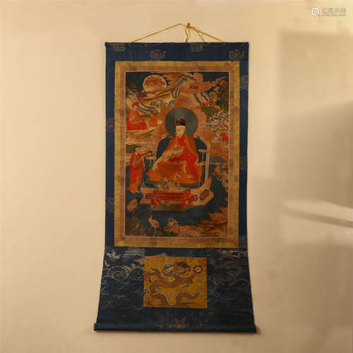 A CHINESE FIGURES INTER MOUNTAIN EMBROIDERED TANGKA