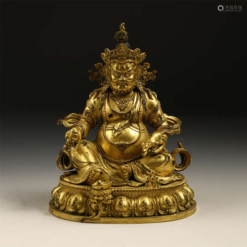 A CHINESE GILT BRONZE JAMBHALA SEATED STATUE