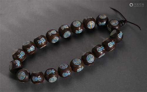 A CHINESE AGALWOOD BEAD BUDDHIST BRACELET