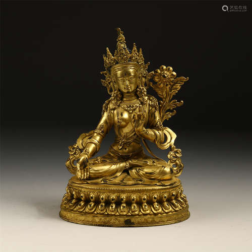 A CHINESE GILT BRONZE LOTUS HAND GUANYIN STATUE