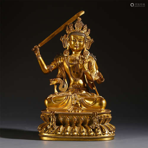 A CHINESE GILT BRONZE FOUR ARM SHOUSHU AVALOKITESHVARA