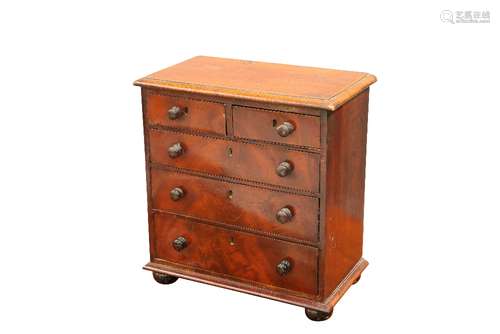 A VICTORIAN MAHOGANY MINIATURE CHEST OF DRAWERS