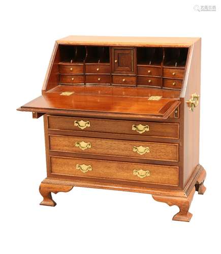 A GEORGIAN STYLE MAHOGANY MINIATURE BUREAU