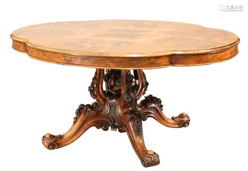 A VICTORIAN WALNUT BREAKFAST TABLE