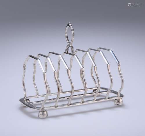 A GEORGE V SILVER SEVEN-BAR TOAST RACK, WILLIAM HUTTON