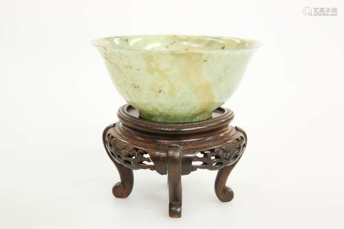 A CHINESE MOTTLED JADE BOWL