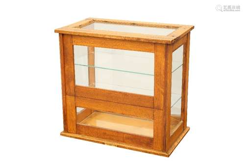 AN OAK COUNTER-TOP DISPLAY CABINET