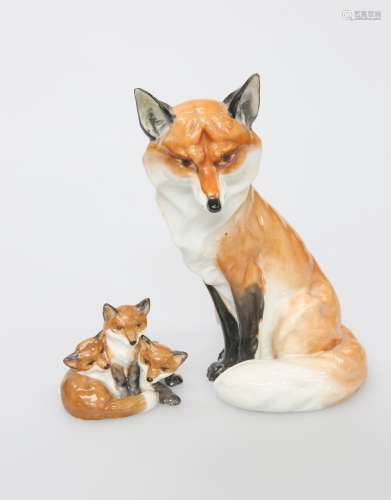A ROYAL WORCESTER MODEL OF A SEATED FOX