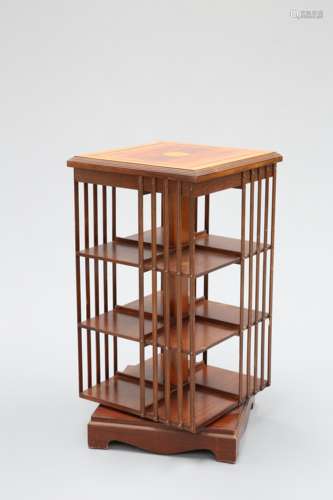 AN INLAID MAHOGANY REVOLVING BOOKCASE