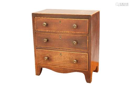 AN EARLY 19TH CENTURY MAHOGANY MINIATURE CHEST OF DRAWERS