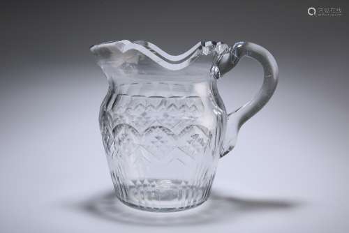 AN IRISH GLASS WATER JUG, CIRCA 1820