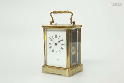 A FRENCH BRASS CASED CARRIAGE CLOCK WITH PUSH BUTTON REPEAT