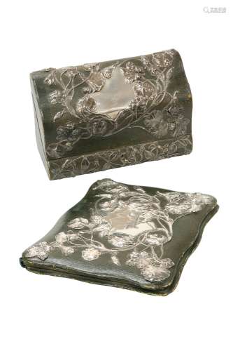 AN ART NOUVEAU SILVER-MOUNTED GREEN LEATHER DESK BOX AND BLOTTER