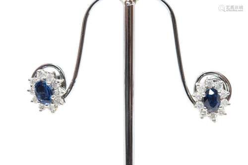 A PAIR OF SAPPHIRE AND DIAMOND CLUSTER EARRINGS