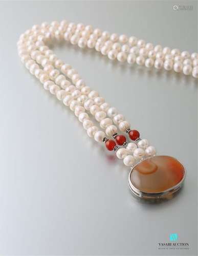 Three row necklace of freshwater cut pearls, with …