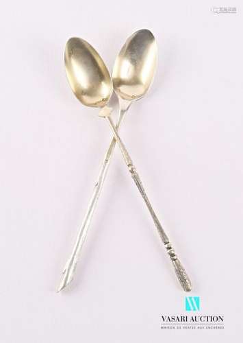 Two silver and silver gilt jam spoons, one with a …