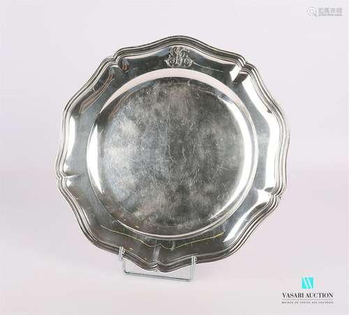 Round hollow silver dish, the edge is hemmed with …