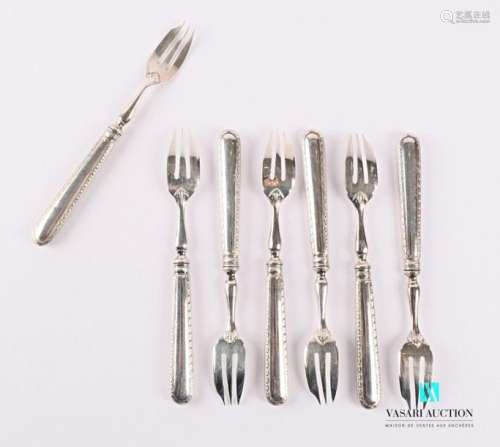 Set of seven metal cake forks, the handle hemmed w…