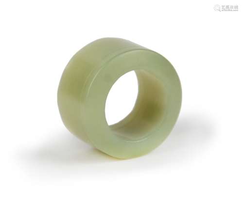 A FINE WHITE JADE CARVED THUMB RING