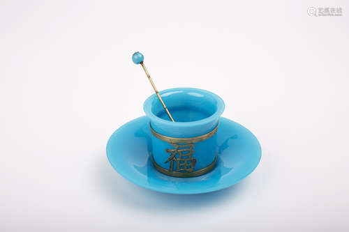 A PAIR OF PEACOCK BLUE PEKING GLASS TEACUP SET