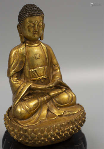 A  BRONZE-GILT BUDDHA STATUE