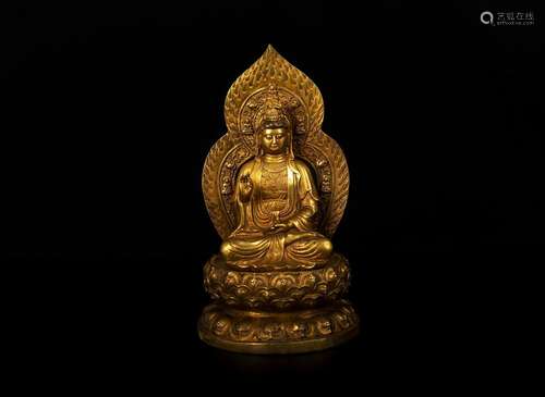 A BRONZE BUDDHA STATUE