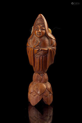 CARVED 'HUANGYANG' WOOD SCULPTURE