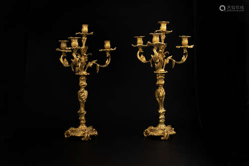 A PAIR OF ANTIQUE BRONZE CANDLE HOULDERS