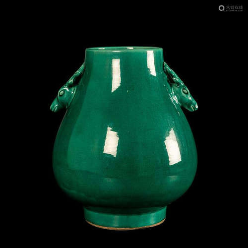 A CHINESE GREEN GLAZED DEER HEAD VASE