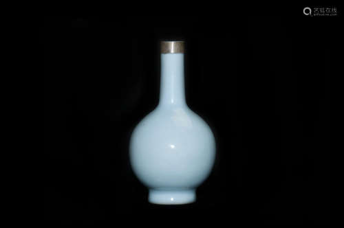 A CYAN-GLAZED VASE