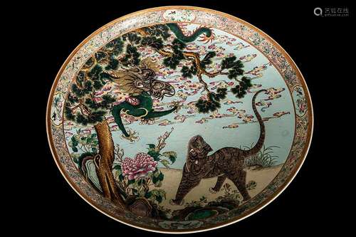 A  LARGE FAMILLE ROSE ‘FENG YUN JI HUI’ PLATE