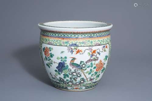 A Chinese famille verte fish bowl with a bird amon...