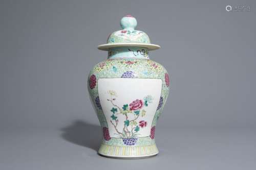 A Chinese famille rose vase and cover with floral ...
