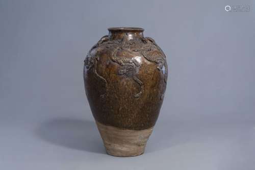 A monochrome brown glazed 'dragon' martaban jar, S...