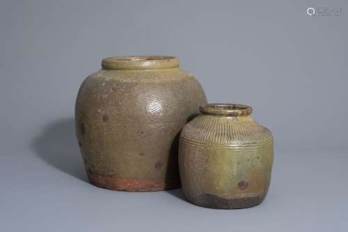 Two green brown storage jars, South East Asia, 19t...