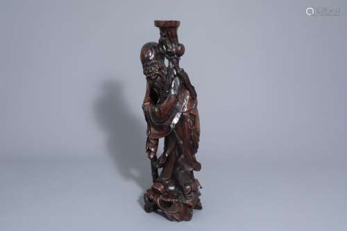 A large Chinese wooden figure of Shou Lao, 19th/20...