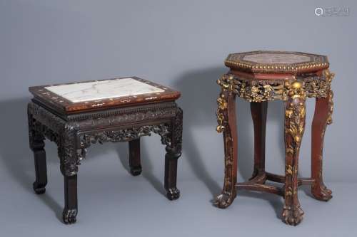 Two Chinese carved wood stands with marble tops, 2...