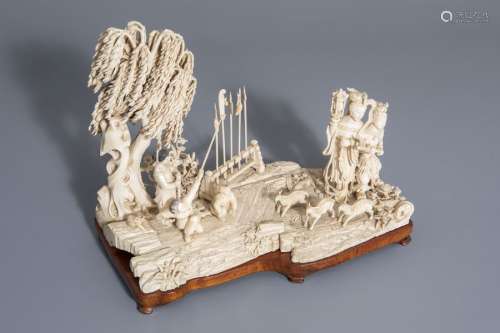 A Chinese carved ivory group depicting the martial...