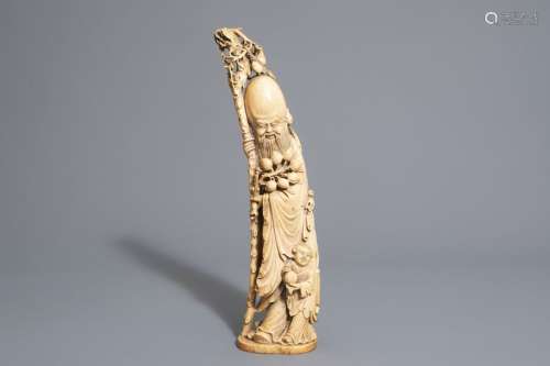 A Chinese ivory group of Shou Lao with a boy, 19th...