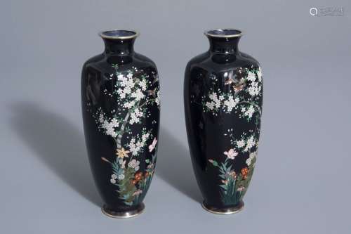 A pair of Japanese cloisonné vases with birds amon...