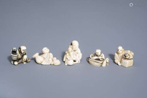Five Japanese ivory netsuke with scenes from daily...