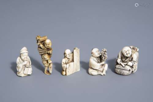 Five Japanese ivory netsuke with scenes from daily...