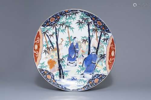 A large Japanese Imari charger with figures in a l...